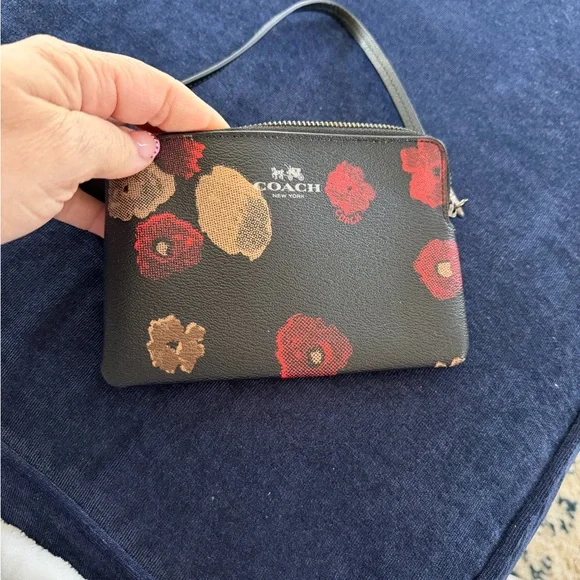Coach Black Wristlet with Red and Tan Floral Design - Picture 1 of 2